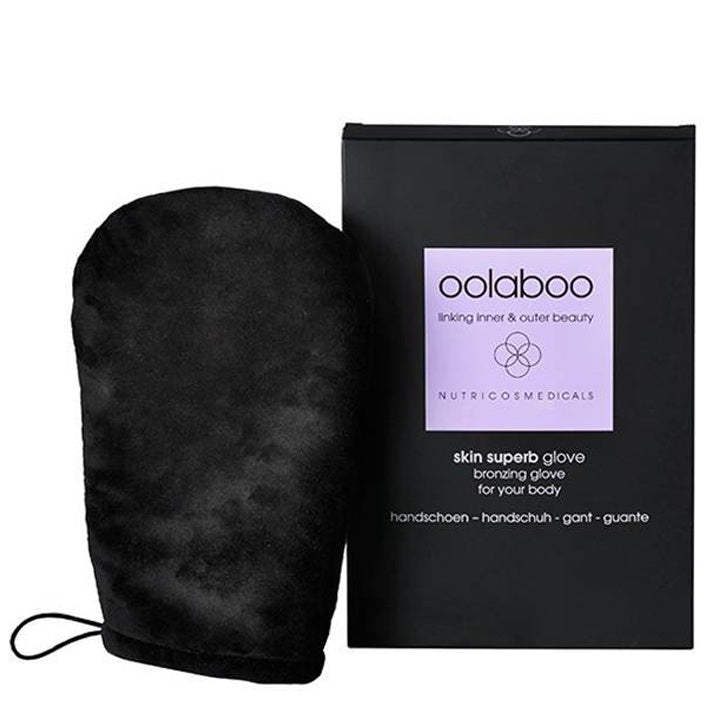 Oolaboo Skin Superb Bronzing Glove gant à côté de la boîte