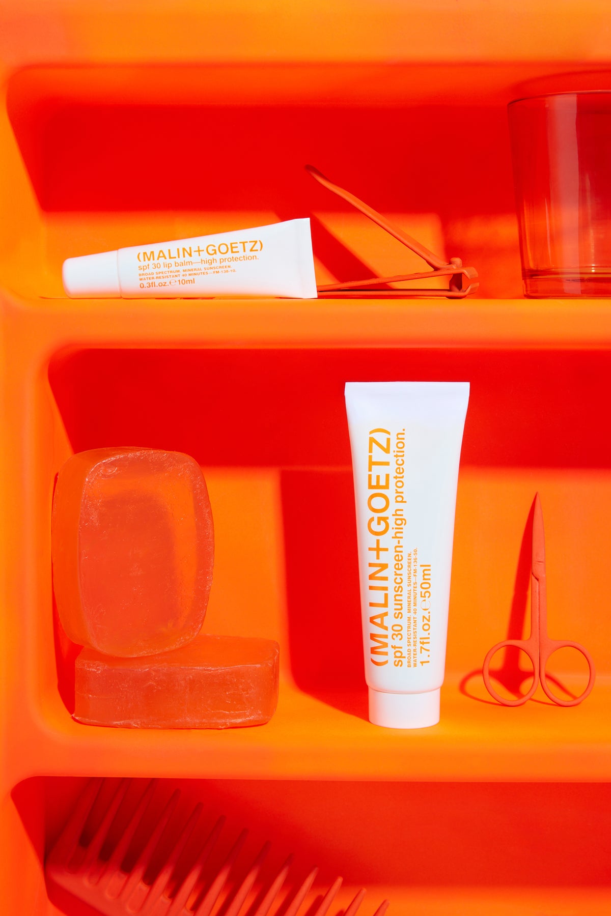 Malin+Goetz lip balm spf et sunscreen ambiance