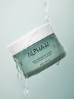 Alpha-H High Tide Water Cream pot sous l’eau courante