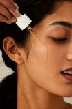 Alpha-H Vitamin C Serum application du sérum à la pipette