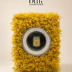 BDK Parfums Eau De Lessive Mimosa dans une machine à laver de fleurs de mimosa