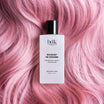 BDK Parfums Hair Perfume Bouquet de Hongrie flacon sur cheveux roses