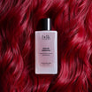BDK Parfums Hair Perfume Rouge Smoking flacon sur cheveux roux